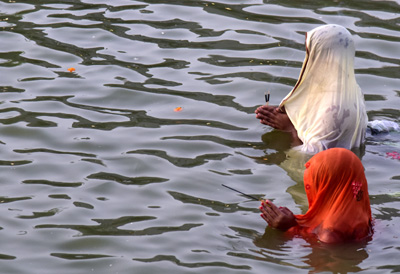 Devotees offer prayers in midst of a lake in Agartala on October 27 during the celebration of ‘Chhath Puja’. Chhath Puja is an important Hindu festival that is mainly celebrated in Bihar, Uttar Pradesh and some regions of Nepal. The puja is dedicated to the worship of the Sun god and his wife Usha. During the occasion, devotees perform puja to thank God for supporting life on earth and seek the divine couple’s blessing.